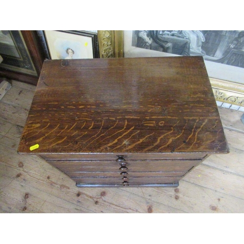 25 - A  small 19th century faux bois painted pine chest of drawers, with oak graining, width 23.5ins, dep... 