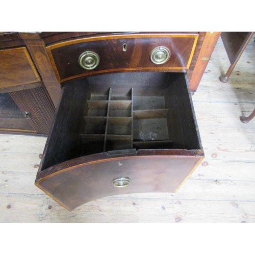 26 - A late Georgian mahogany sideboard, having tambour sliding doors, flanked by cellarette drawer and a... 