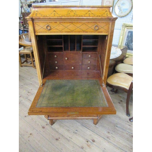 32 - A satinwood and marquetry inlaid cabinet, inlaid all round, fitted with one long drawer over a fall ... 