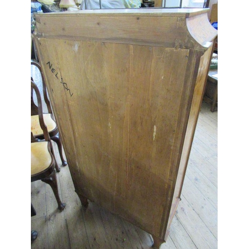 32 - A satinwood and marquetry inlaid cabinet, inlaid all round, fitted with one long drawer over a fall ... 