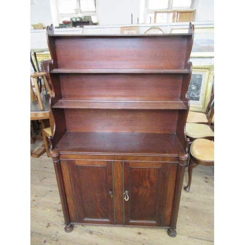 34 - A 19th century mahogany waterfall bookcase/ chiffonier, having waterfall set of shelves over cupboar... 