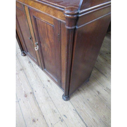 34 - A 19th century mahogany waterfall bookcase/ chiffonier, having waterfall set of shelves over cupboar... 