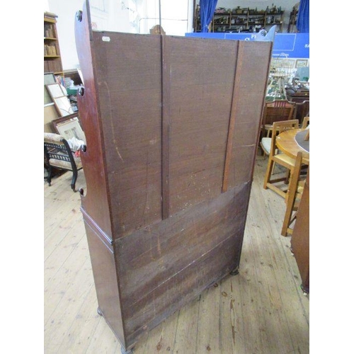 34 - A 19th century mahogany waterfall bookcase/ chiffonier, having waterfall set of shelves over cupboar... 