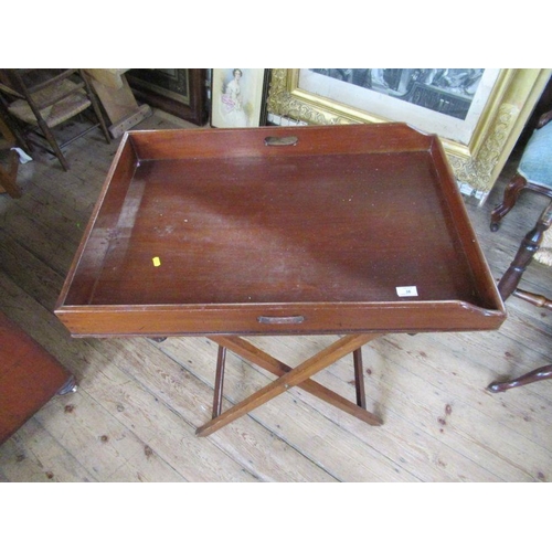 36 - A 19th century mahogany butlers tray with stand, 31ins x 21.5ins,height 31.5ins