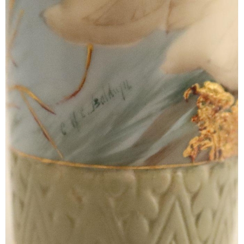 386 - A Royal Worcester cylindrical vase, with open fret work top, painted with swans in flight to a powde... 