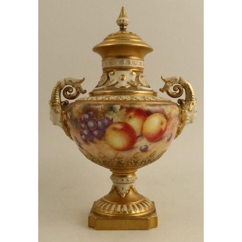 388 - A Royal Worcester covered pedestal vase, painted all round with fruit to a mossy ground by Freeman, ... 