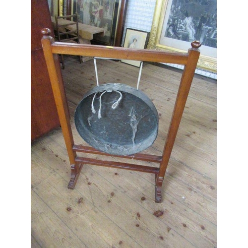 39 - A table gong, width 22ins, height 32ins