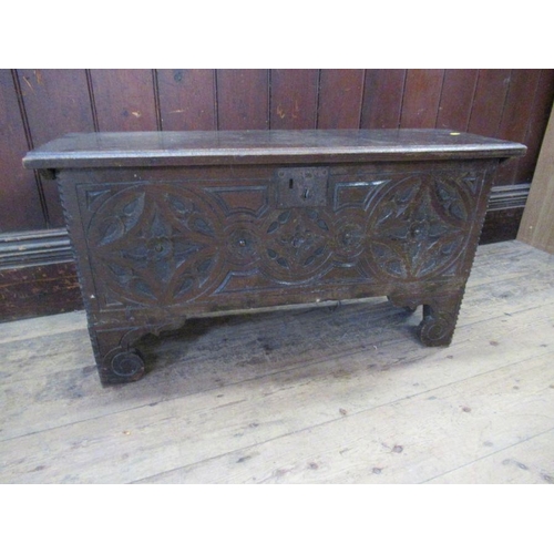 41 - A small Antique oak coffer, with carved decoration to the front,  width 34ins, depth 11.5ins, height... 