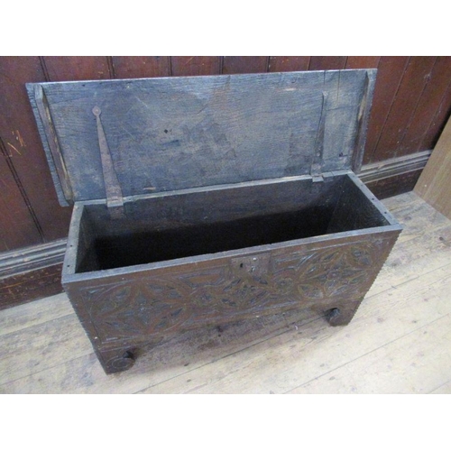 41 - A small Antique oak coffer, with carved decoration to the front,  width 34ins, depth 11.5ins, height... 