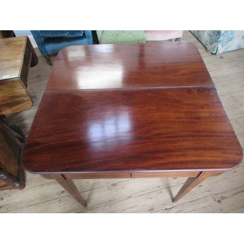 52 - A 19th century mahogany fold over table, width 39ins, height 29ins