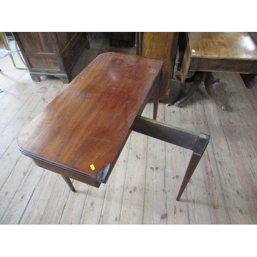 52 - A 19th century mahogany fold over table, width 39ins, height 29ins