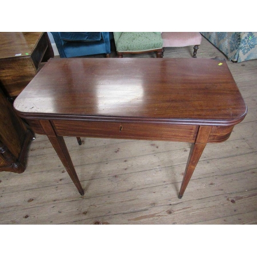 52 - A 19th century mahogany fold over table, width 39ins, height 29ins