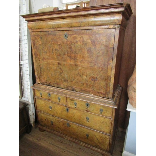 55 - An 18th century walnut secretaire cabinet, the drop down top section revealing drawers, over the bas... 