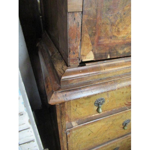 55 - An 18th century walnut secretaire cabinet, the drop down top section revealing drawers, over the bas... 