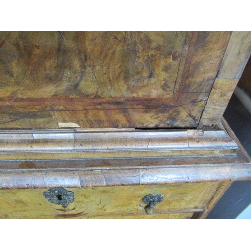 55 - An 18th century walnut secretaire cabinet, the drop down top section revealing drawers, over the bas... 