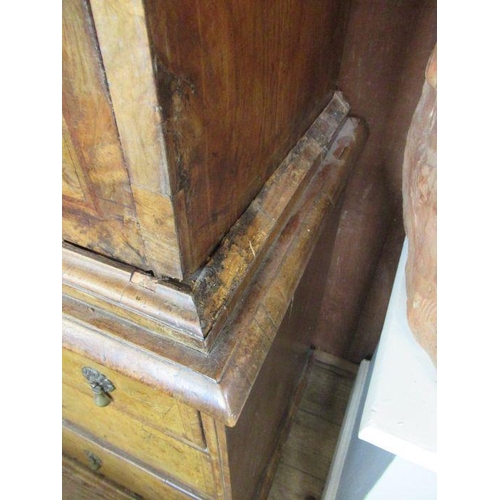 55 - An 18th century walnut secretaire cabinet, the drop down top section revealing drawers, over the bas... 