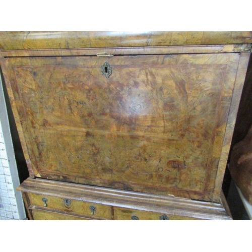 55 - An 18th century walnut secretaire cabinet, the drop down top section revealing drawers, over the bas... 