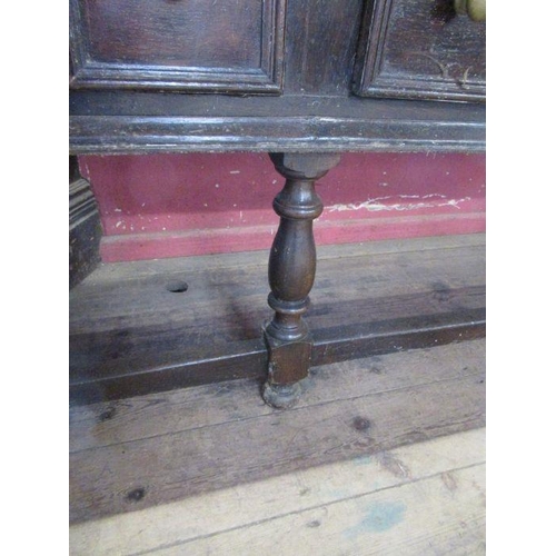 58 - A large Antique oak dresser, having a plate rack over the dresser base, fitted with four short drawe... 