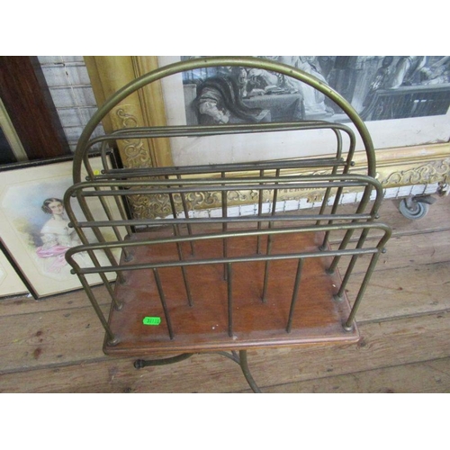 6 - A brass revolving magazine rack, width 14ins, height 34ins