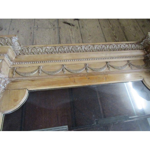 64 - A Regency triple plate mirror, having carved and applied decoration, width 58ins, height 33ins