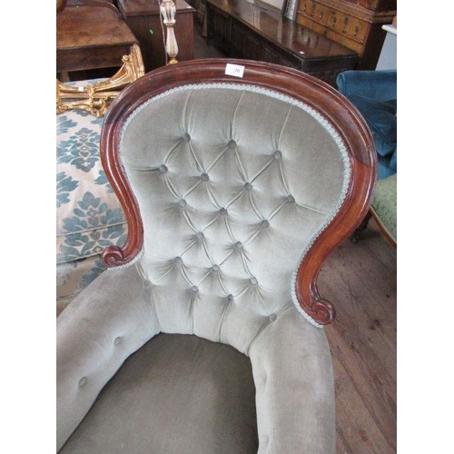 70 - A Victorian gentleman's button backed chair, with mahogany frame and sage green covers