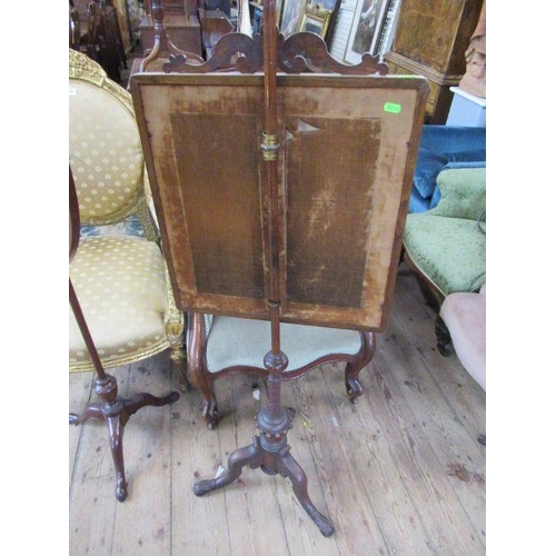 73 - A 19th century mahogany pole screen, decorated with a tapestry