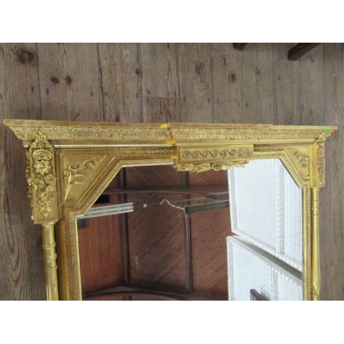 9 - A 19th century gilt framed over mantle mirror, the frame having ornate craved decoration, total widt... 