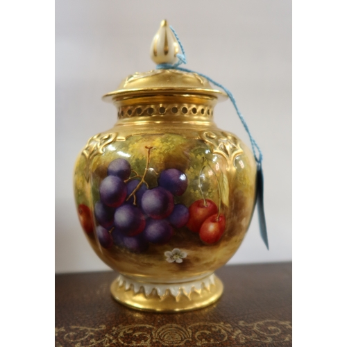 394 - A Royal Worcester covered pot pourri, the quarter lobed body decorated to the front with fruit to a ... 