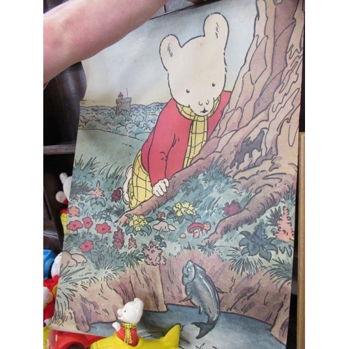 113 - A collection of Rupert Bear soft toy, models, poster, print and laundry basket