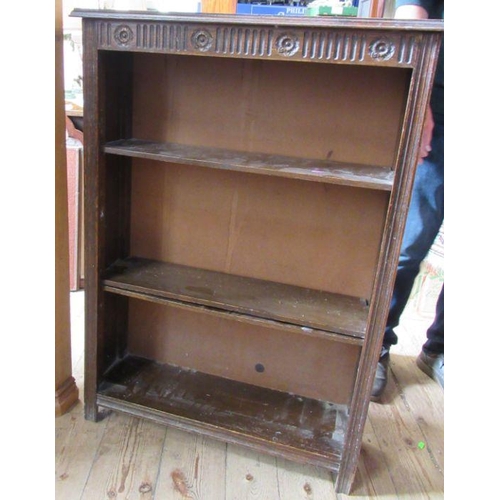 12 - A small oak double corner cupboard, height 60ins, together with a chavel mirror and a bookcase, heig... 