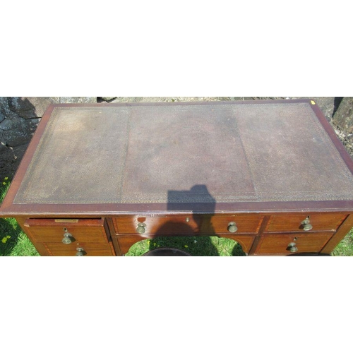 13 - An Edwardian mahogany five drawer writing table, with leather inset top, having satinwood inlay, 42i... 