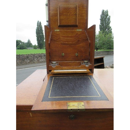 14 - A late 19th century oak full front writing box, with stationary compartments, height 12ins, width 11... 