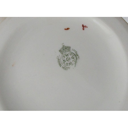 170 - Three pieces of Royal Worcester blush ivory, to include a claret jug, a shell centre piece and a two... 