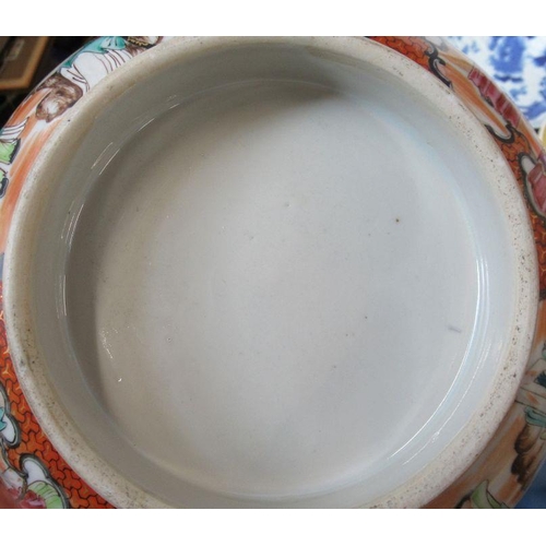 177 - An Oriental bowl, decorated with figures in polychrome colours, diameter 10.5ins - has a minor chip ... 