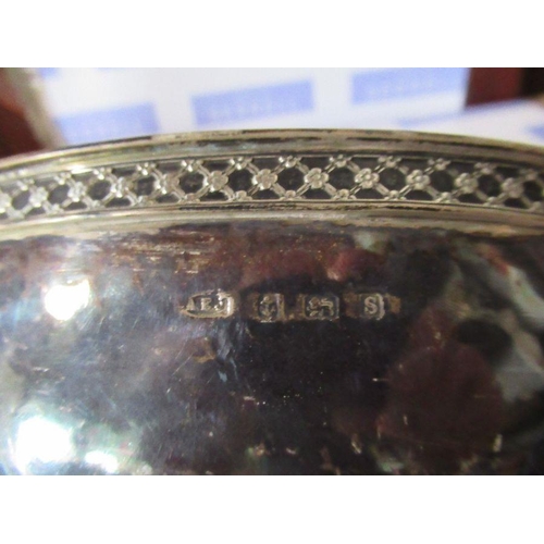 203 - An A.E.Jones hallmarked silver oval bowl, with hammer beaten finish, weight 13oz