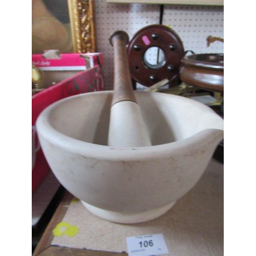 208 - A box of sundry metalware to include pestle and mortar, targets etc