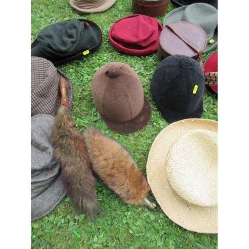 211 - A collection of hats, including bowler, vintage children's riding hats, a Herbert Johnson hat box an... 