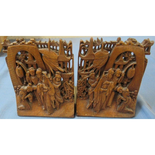 259 - A pair of carved bamboo and brass bookends