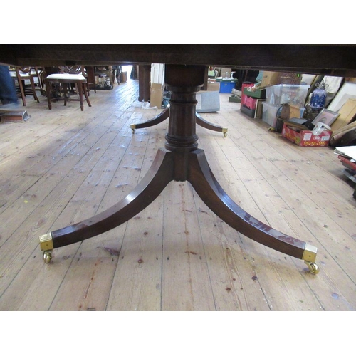 35 - A twin pedestal mahogany table with two leaves   125.5ins x 48.5ins height 29.5ins closed length 78i... 