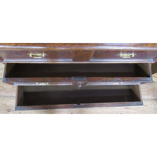 45 - An Antique oak mule chest, with hinged rising lid over two long drawers, 36ins x 23ins, height 21ins