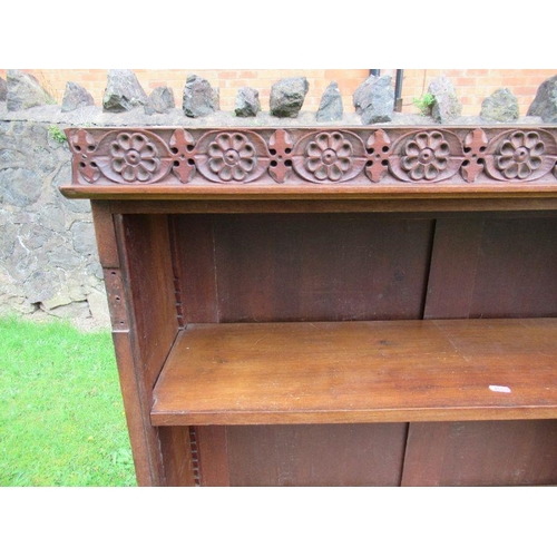 61 - A bookcase, with carved decoration, width 40ins, depth 12ins, height 45ins