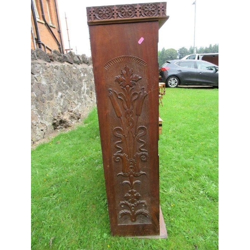 61 - A bookcase, with carved decoration, width 40ins, depth 12ins, height 45ins