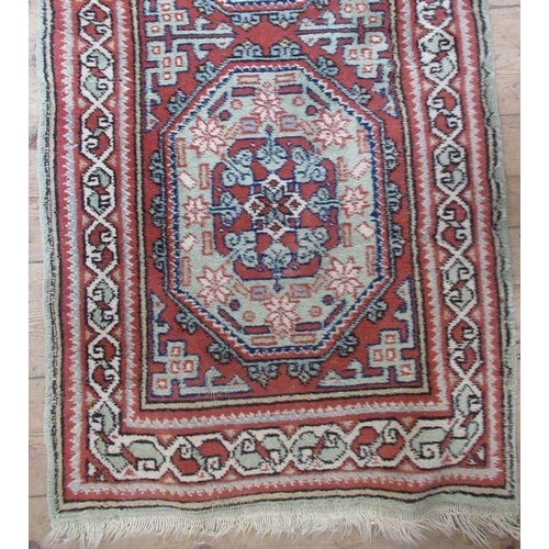 82 - An Eastern design runner, 27ins x 120ins