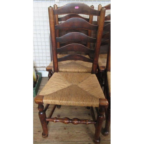 99 - A set of 6 (4+2) Antique ladder back dining chairs, with rush seats