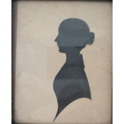 185 - A pair of framed portrait silhouettes, of a man and a woman, 3.75ins x 3.25ins