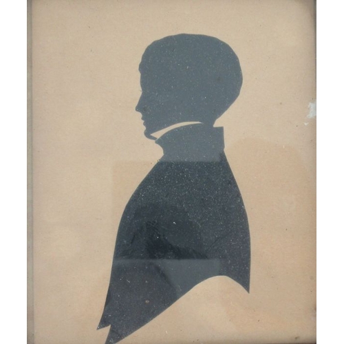 185 - A pair of framed portrait silhouettes, of a man and a woman, 3.75ins x 3.25ins