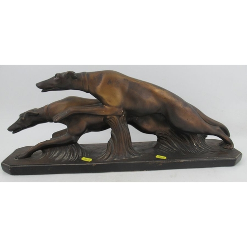 197 - A Bacci & Bacci Art Deco plaster model, of two running grey hounds, length 23.25, height 9.5ins