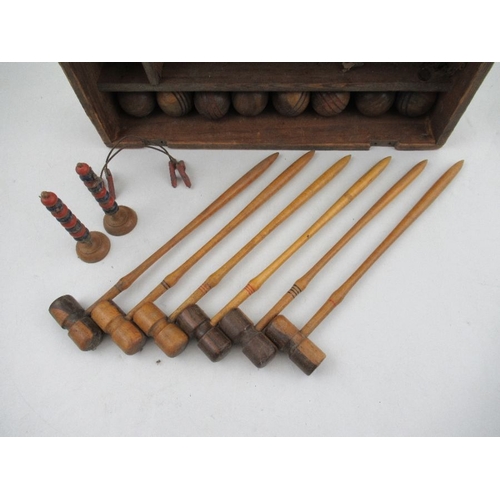 200 - A late Victorian/Edwardian table top miniature croquet set, comprising six mallets, mallet length 10... 