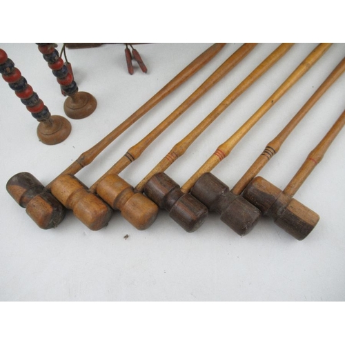 200 - A late Victorian/Edwardian table top miniature croquet set, comprising six mallets, mallet length 10... 