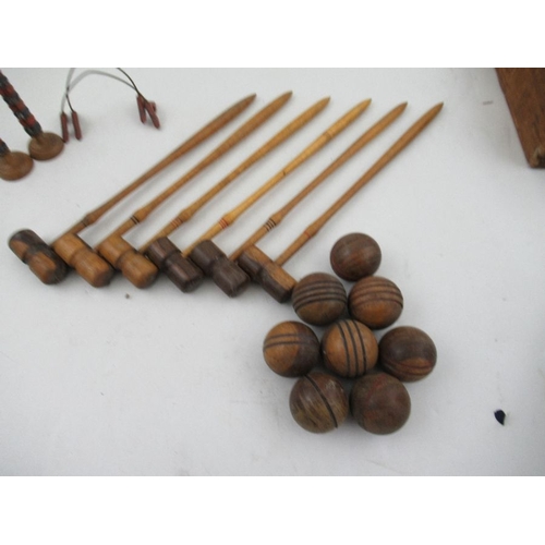 200 - A late Victorian/Edwardian table top miniature croquet set, comprising six mallets, mallet length 10... 